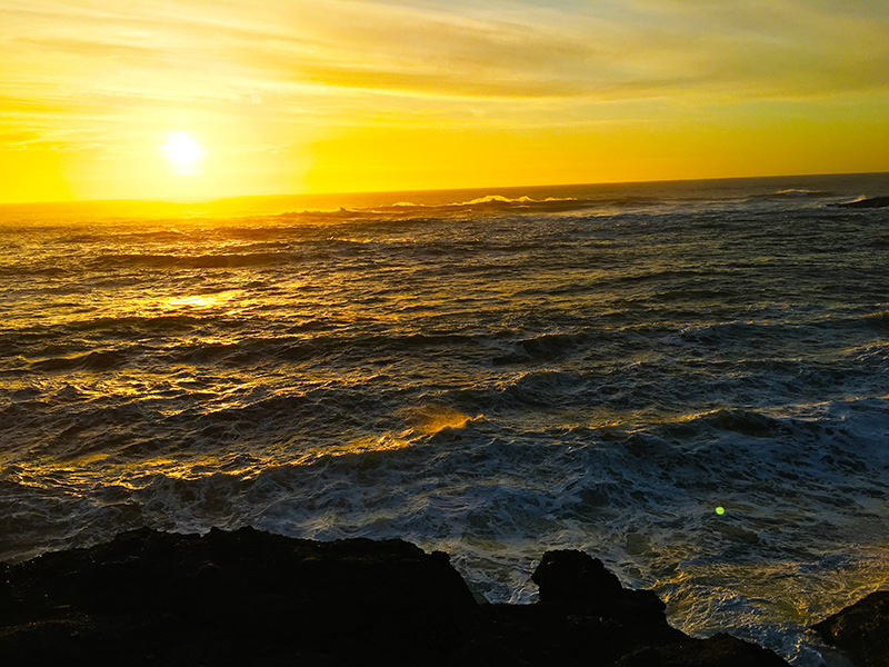 Sun setting over Oregon's western coast